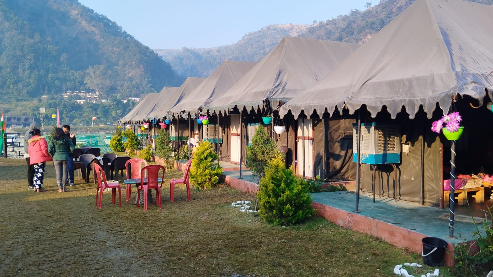 river side swiss tent with swimming pool